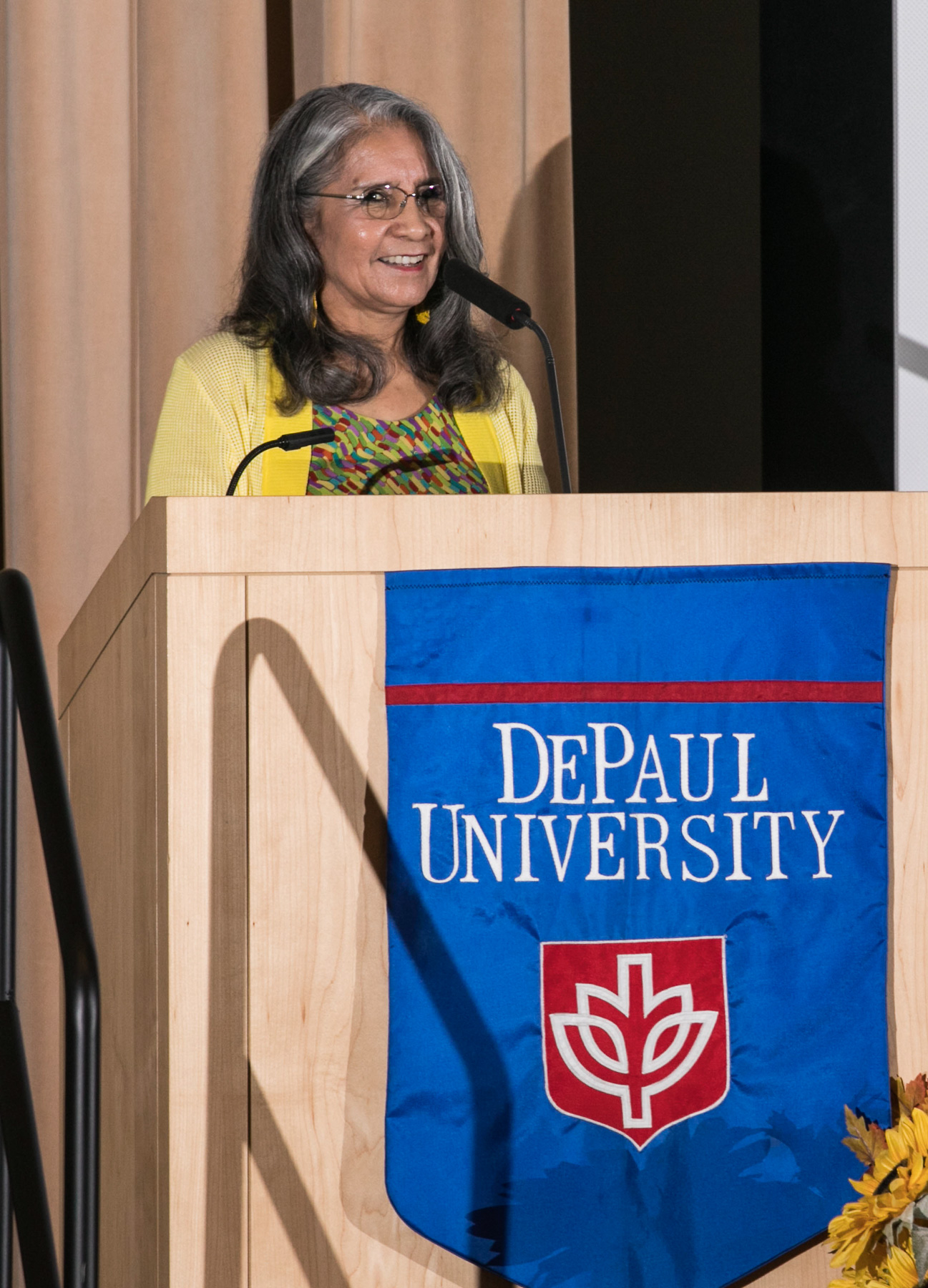 Virginia Martinez, one of the first Latina graduates of DePaul's School of Law, talks about her career as an advocate for Latinos, women, children and the poor during her speech at the 2017 Dolores Huerta Prayer Breakfast. (DePaul University/Jamie Moncrief)